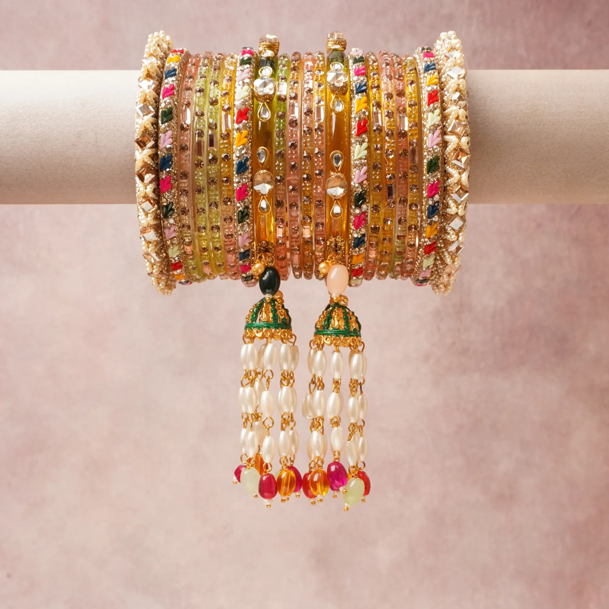 A commanding Clear Translucent anchors this beautiful set, enriched with accents of Ruby Red, Fuchsia Pink, Emerald Green, Sapphire Blue, Lemon Yellow, Tangerine Orange, Turquoise, Sky Blue, Mint Green, Jet Black, Peach, Sage Green that add depth and dimension.

Featuring a striking composition of Glass, Metal Alloy (Gold-toned), Cultured Pearls, Enamel, Clear Glass Rhinestones, Polished Colored Beads, this set carries intricate craftsmanship and strong presence. Grand in form, it is created for moments that deserve to be marked.